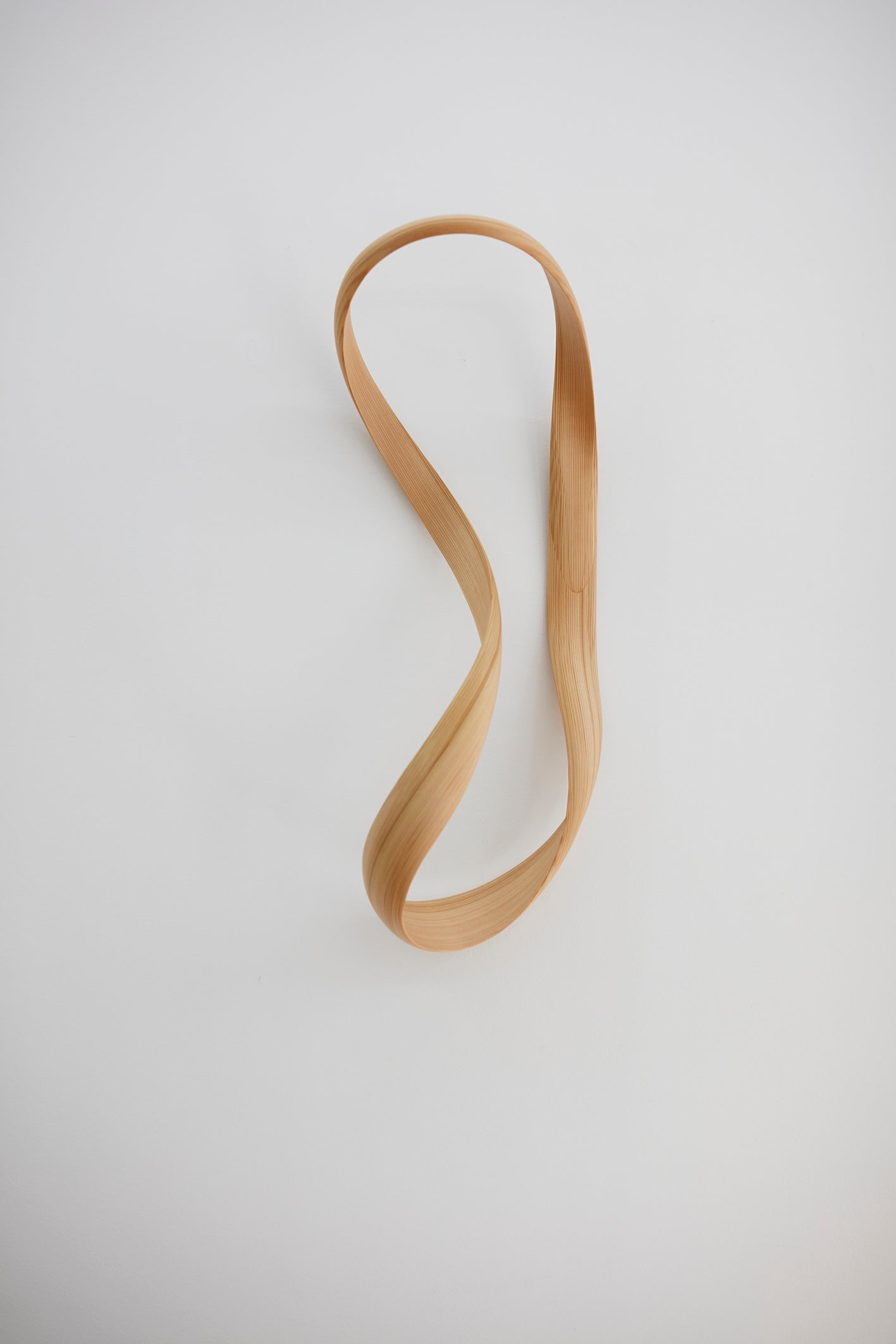 Wood wall sculpture by Kenta Hirai